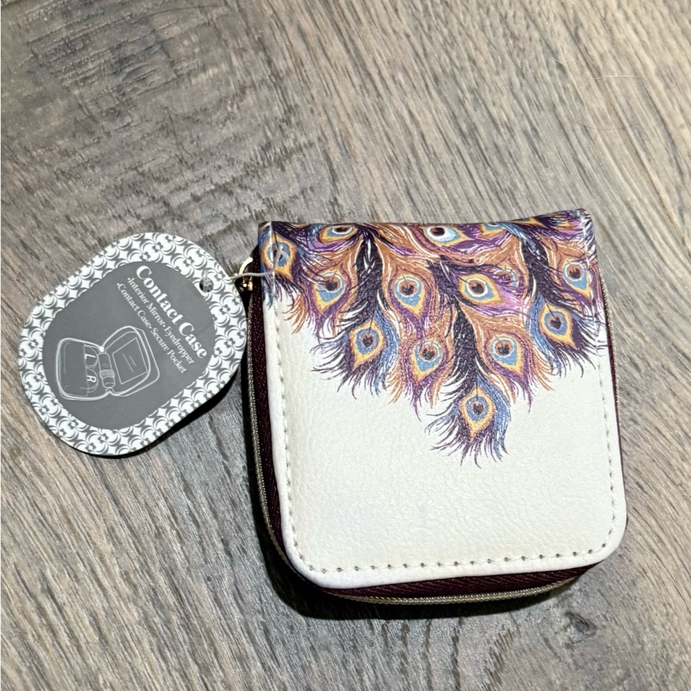 Leather contacts case w/ peacock feather design.